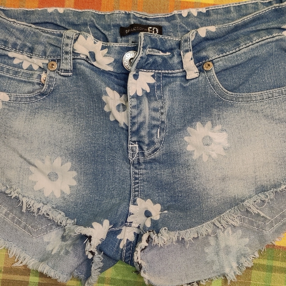 Slightly distressed Seductions short shorts